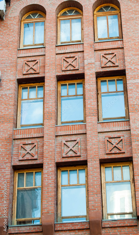Fototapeta premium Красивые части зданий кона балконы кирпич текстура архитектура 