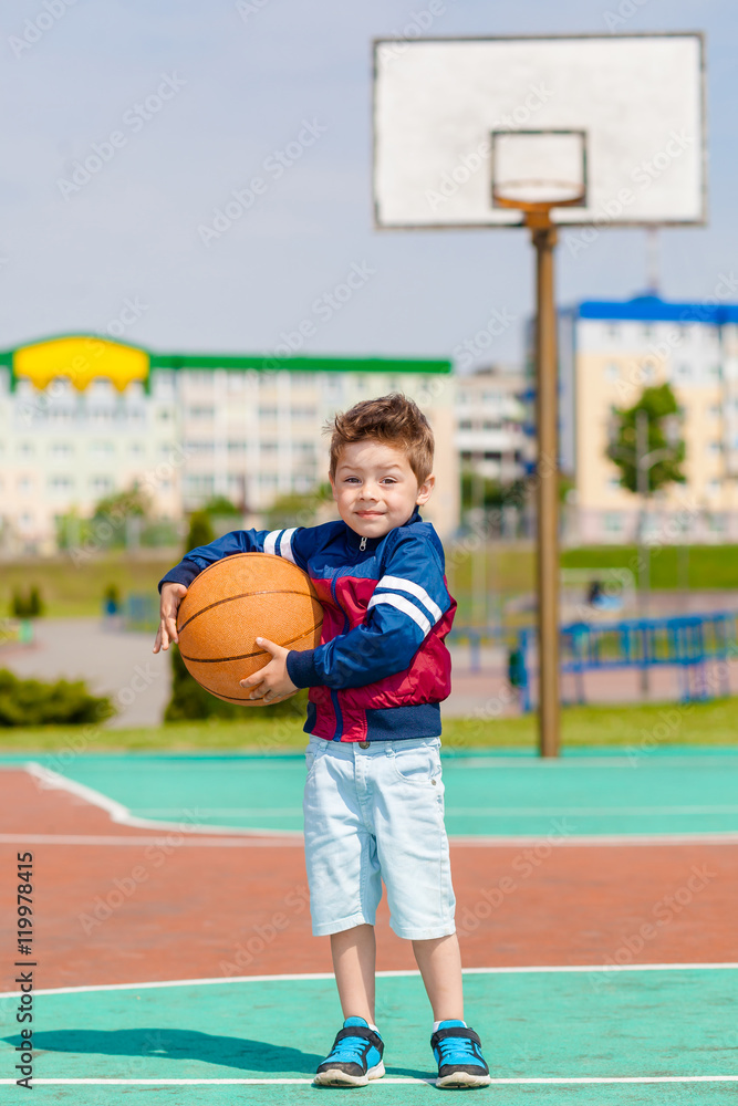 little boy playing basketball little boy playing basketball
