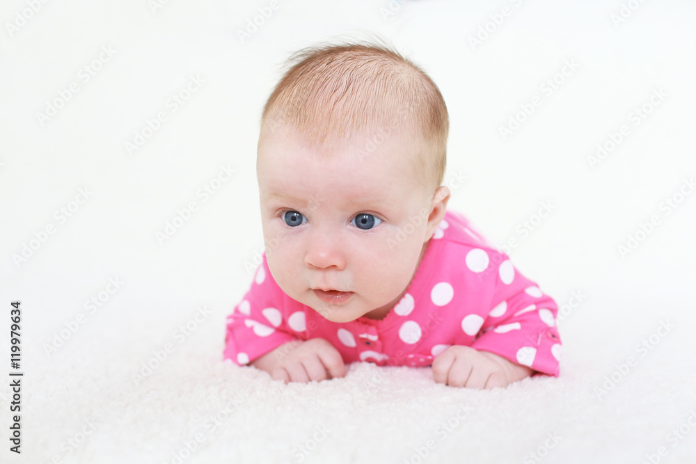 lovely 2 months baby girl on belly lovely 2 months baby girl on belly