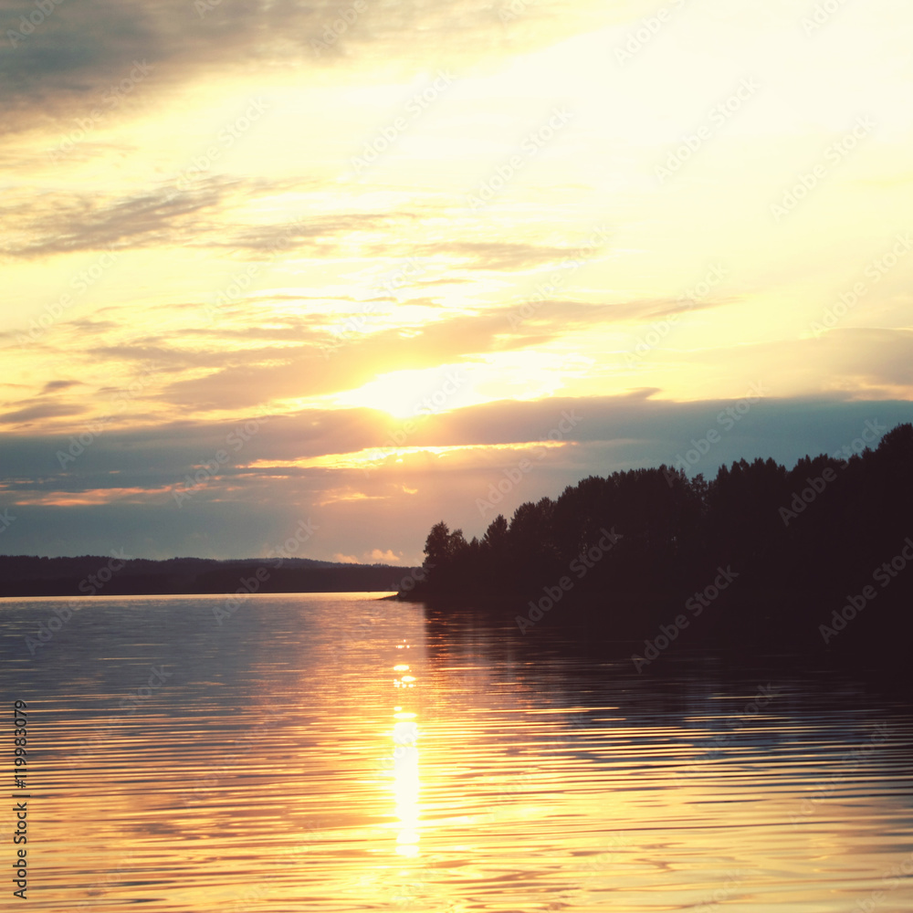 Kenozero lake at sunset. Beautiful northern landscape. Aged photo. Wild nature of Russian North. Vintage photo. Kenozersky National Park (UNESCO Biosphere Reserve), Russia.