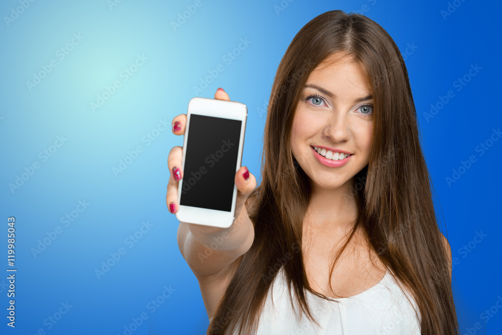 Smiling woman showing smartphone screen