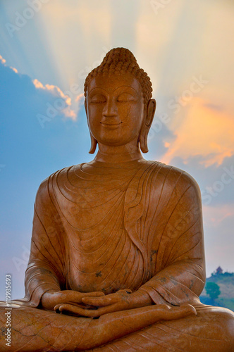 Sunset Behind Buddha Image