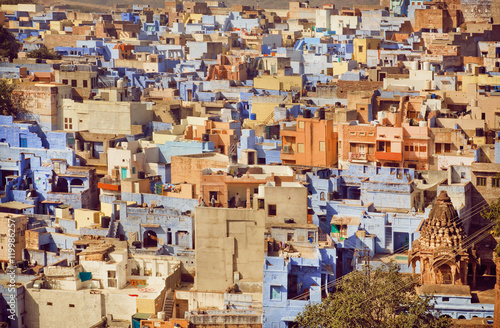 Yellow color and blue concrete constructions of historical city in India © radiokafka