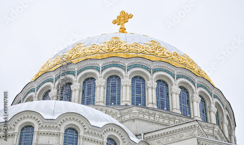 Kronstadt, Russia. The main dome and windows of the Naval cathedral of Saint Nicholas in winter. photo