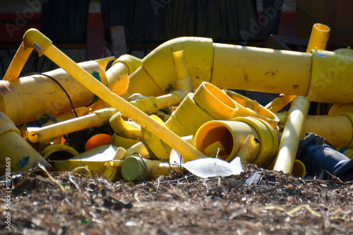 Waste; Broaken yellow plastic pipes photo