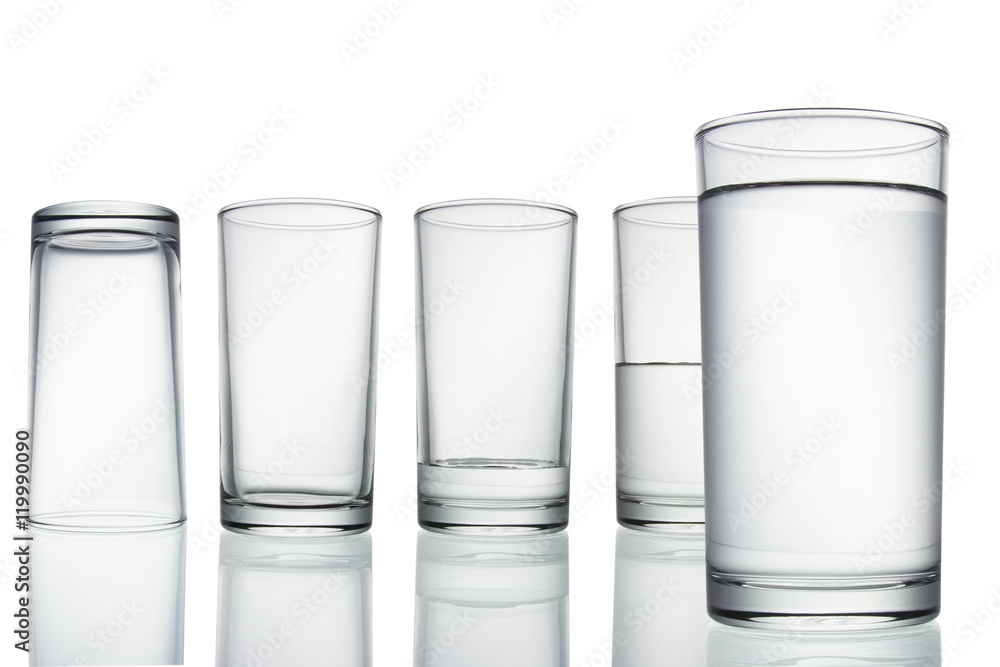 .tall empty, half and full glass of water isolated on white with .tall empty, half and full glass of water isolated on white with
