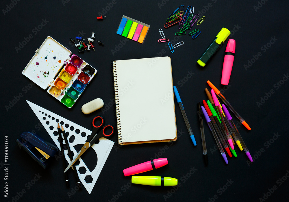 School supplies on blackboard background ready for your design School supplies on blackboard background ready for your design