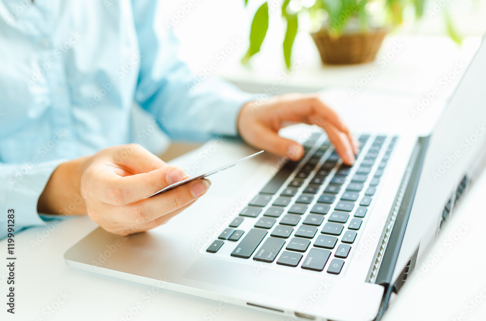 Woman office worker typing on the keyboard Woman office worker typing on the keyboard