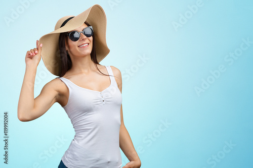 Young pretty woman in a straw hat
