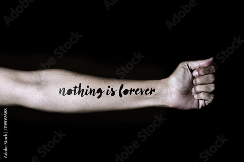 Canvastavla text nothing is forever in a forearm