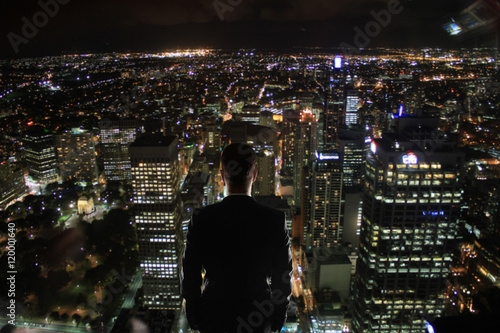 Businessperson looking at night
