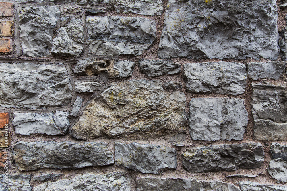 close up of old brick or stone wall background close up of old brick or stone wall background