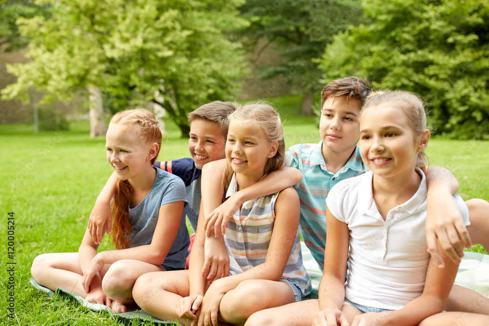 group of happy kids or friends outdoors group of happy kids or friends outdoors