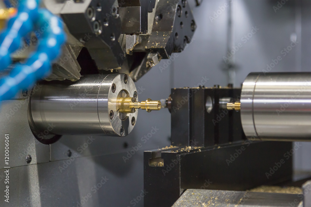 Steel metal cutting machine process by CNC lathe in workshop Steel metal cutting machine process by CNC lathe in workshop
