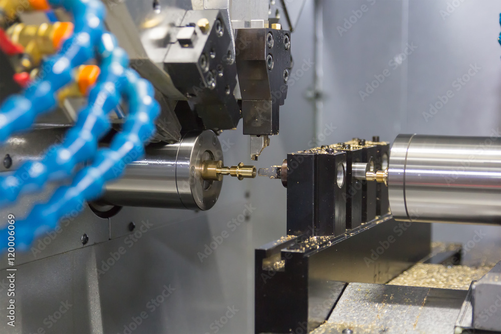 Steel metal cutting machine process by CNC lathe in workshop Steel metal cutting machine process by CNC lathe in workshop