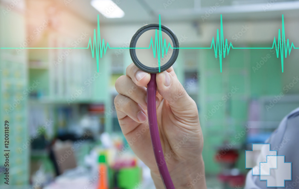 Φωτογραφία Doctor with stethoscope in hand and EKG graph monitor, health and medical concept