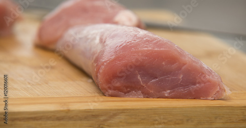 Fresh and raw meat. Sirloin on wood background