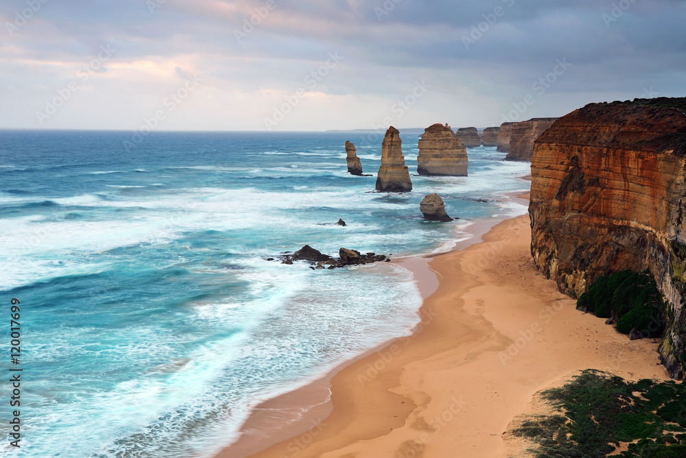 Cloudy day in Twelve Apostles Sea rock in Port Campbell National park, one of the most famous iconic natural landmark along Great Ocean Road i