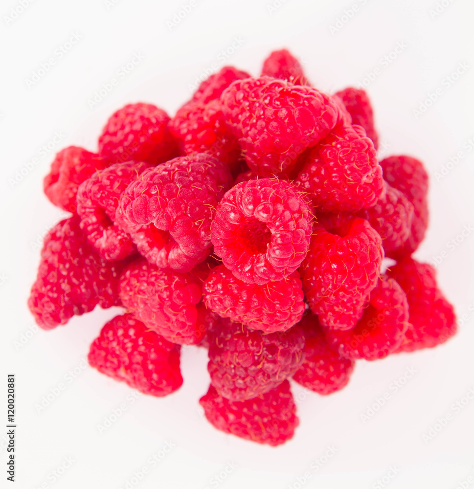 Raspberries: a stack of fruit on white background Raspberries: a stack of fruit on white background
