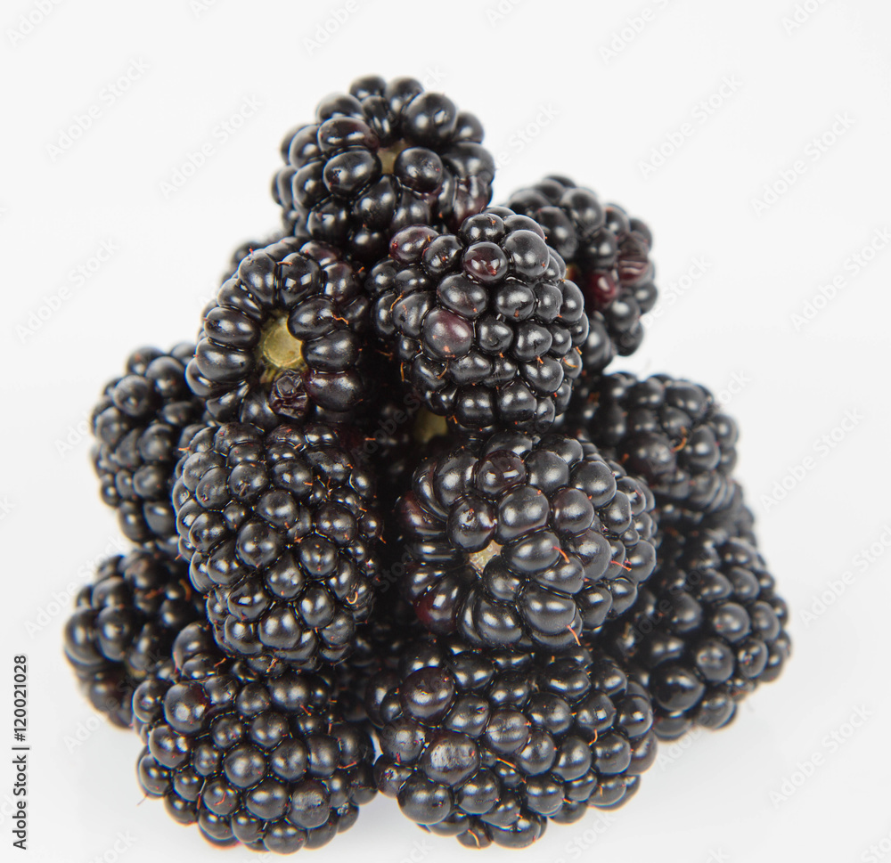 Blackberries: a stack of fruit on white background Blackberries: a stack of fruit on white background