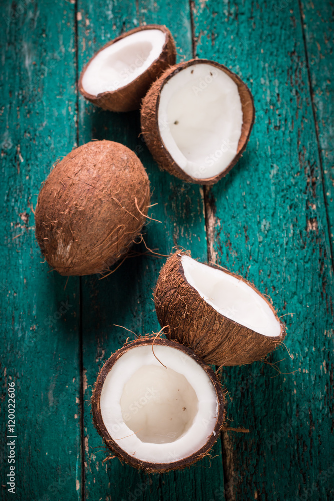 Coconut on wooden table. Coconut on wooden table.