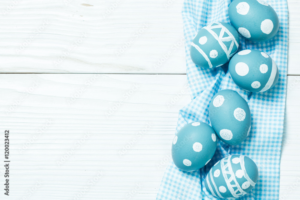Easter concept with colored eggs on wooden background Easter concept with colored eggs on wooden background
