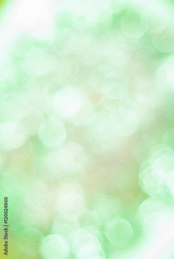 Blurred background with bokeh lights in green pastel colours Blurred background with bokeh lights in green pastel colours
