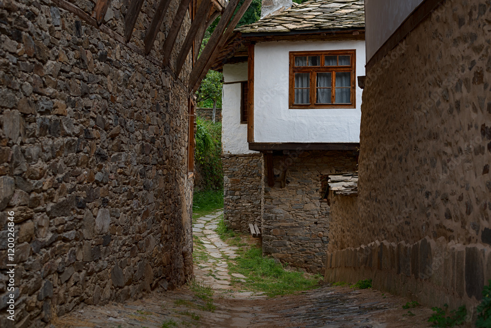 Summer time along the streets of Kovachevitsa village, Bulgaria Summer time along the streets of Kovachevitsa village, Bulgaria