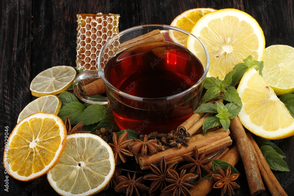 tea with honey and spices on wooden background tea with honey and spices on wooden background