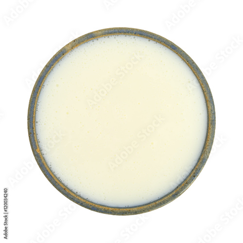 Εκτύπωση καμβά Bowl of buttermilk on a white background top view.