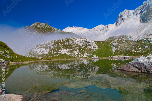 Glacial small lake Lu  nica at Julian Alps  Krn   Slovenia  
