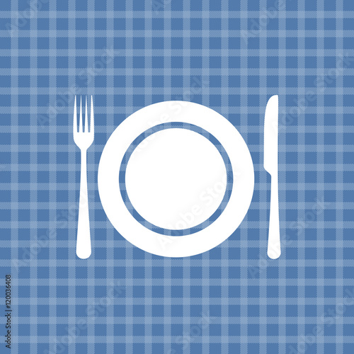 Plate knife and fork on blue picnic checkered tablecloth