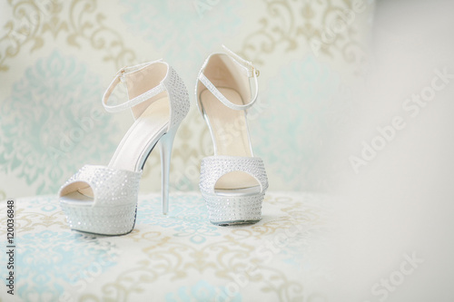 Elegant and stylish bridal shoes. Shallow DOF and selective focus