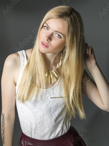 young blonde women closeup portrait in studio