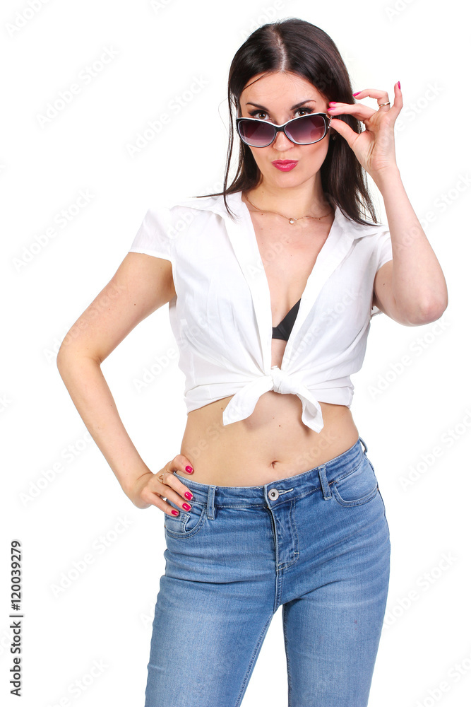 Fashionable portrait of a brunette in sunglasses Fashionable portrait of a brunette in sunglasses