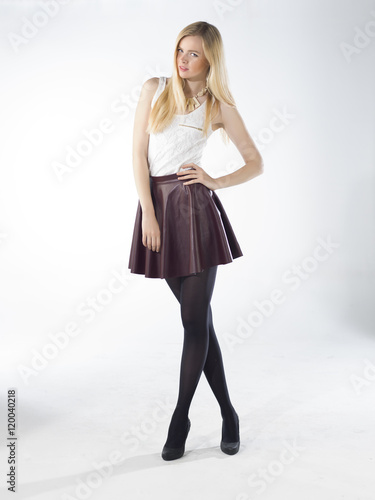 Wallpaper Mural young blonde women with leather skirt in studio Torontodigital.ca