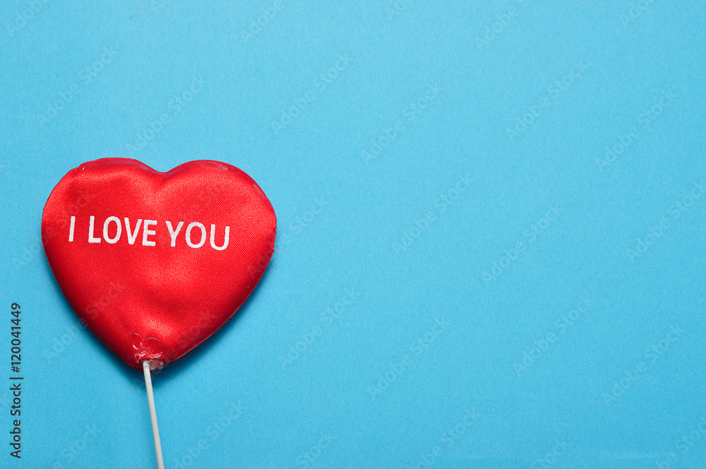 Fototapeta premium Valentine's Day. A red heart with I love you written on it 
