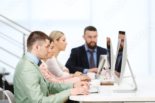 People working on computers...