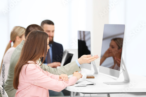 People working on computers...
