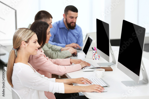 People working on computers...
