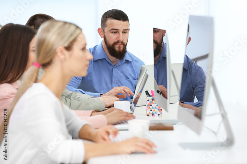 People working on computers...