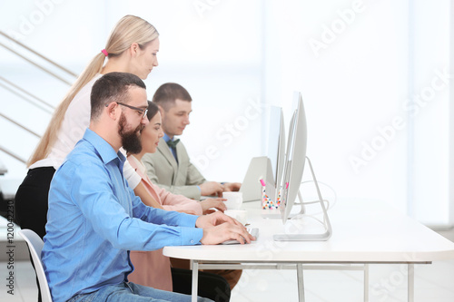 People working on computers...