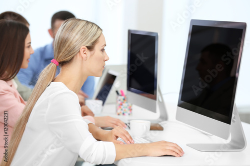 People working on computers...