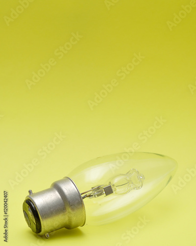 A light bulb isolated on a yellow background