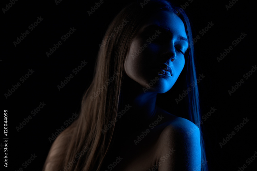 Colored light on brunette girl Colored light on brunette girl