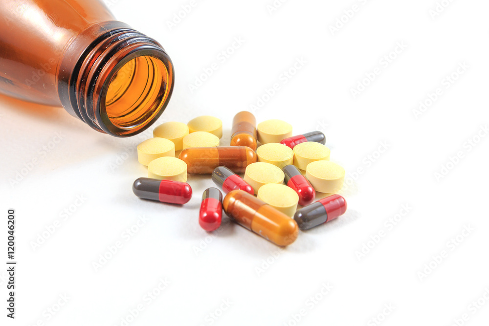 Medicines, supplements and drugs in a bottle on a white background. Medicines, supplements and drugs in a bottle on a white background.