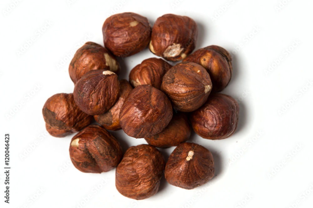 Shelled hazelnuts isolated on white Shelled hazelnuts isolated on white