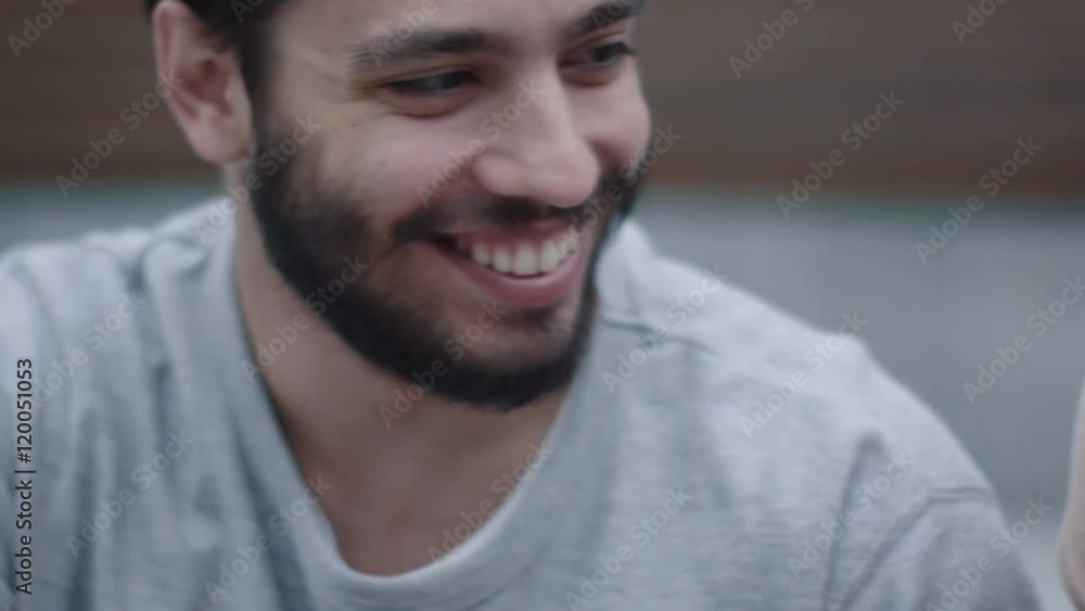 Young Happy Smiling Man and Woman are Communicating Outdoors. Close-up, Slow Motion Shot. Shot on RED Cinema Camera in 4K (UHD). Young Happy Smiling Man and Woman are Communicating Outdoors. Close-up, Slow Motion Shot. Shot on RED Cinema Camera in 4K (UHD).