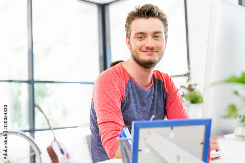 Young man working in office