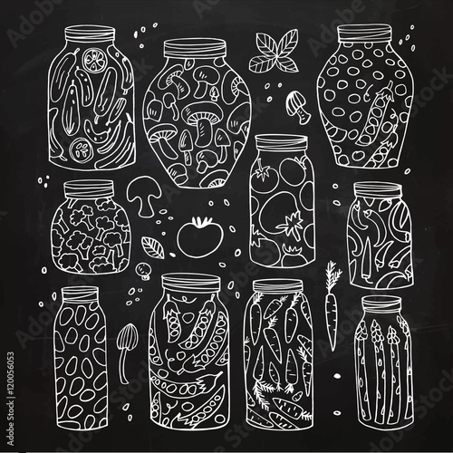 Preserved hand-drawn vector vegetables in jars isolated on chalkboard